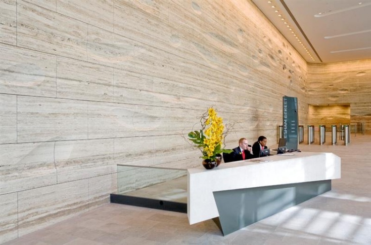 sculpted travertine wall design