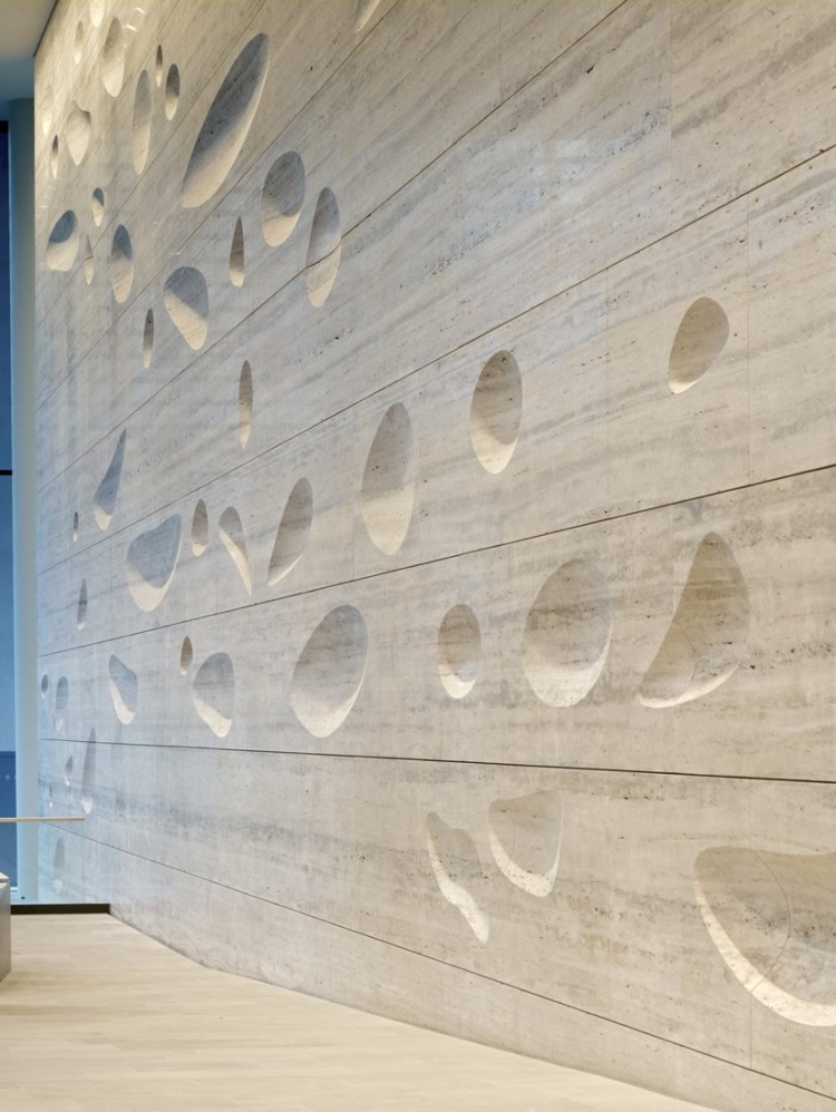 sculpted travertine wall design
