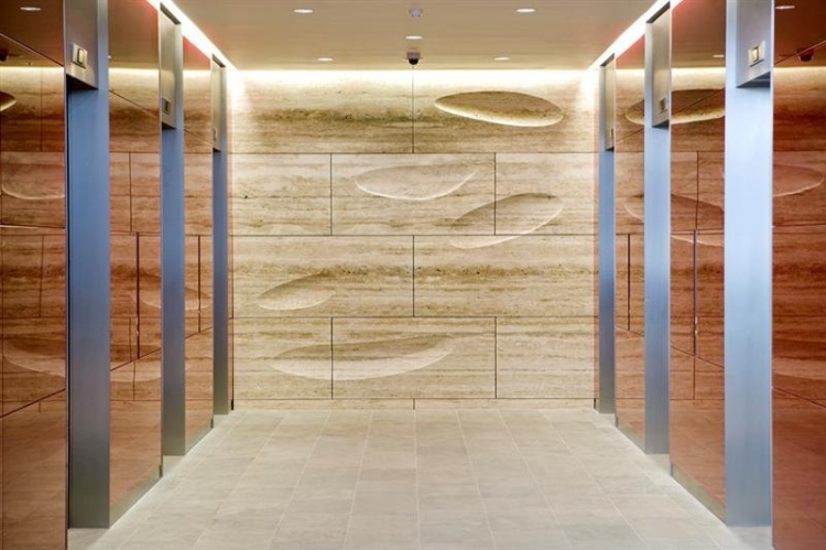 sculpted travertine wall design