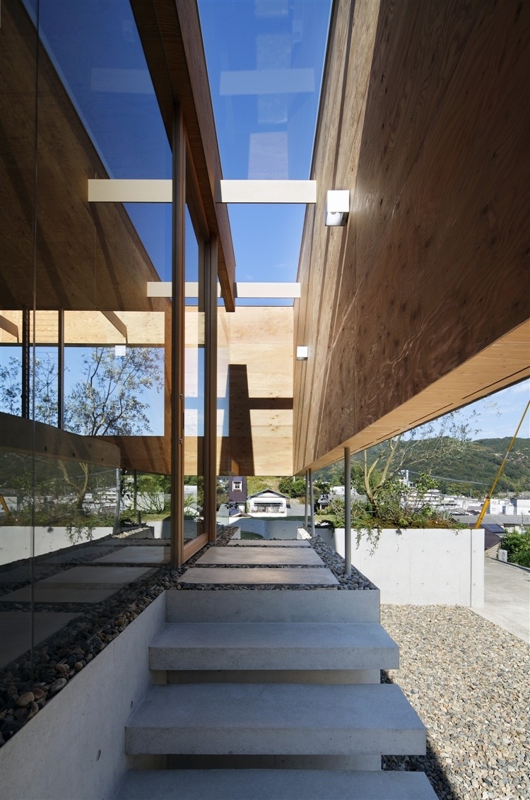 The Pit House by UID Architects & Associates