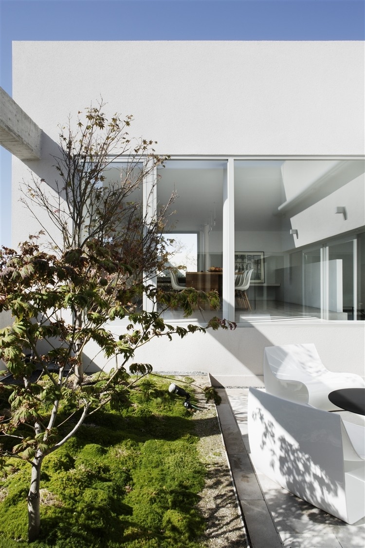 Ático en U by ÁBATON Arquitectura