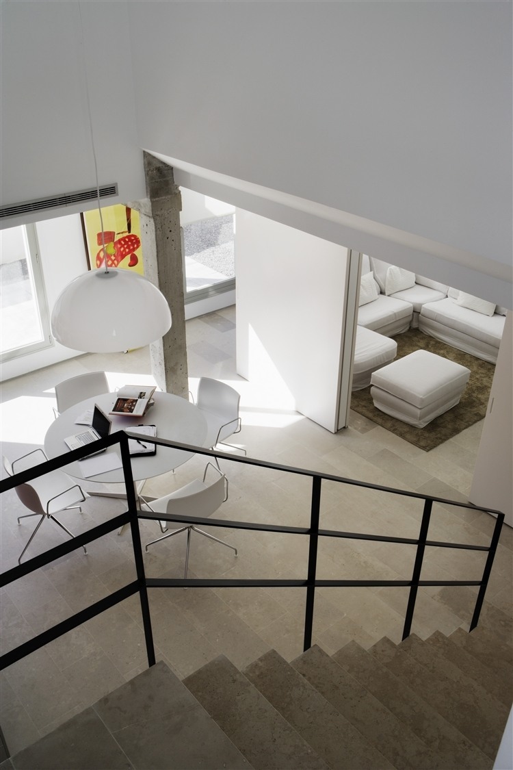Ático en U by ÁBATON Arquitectura