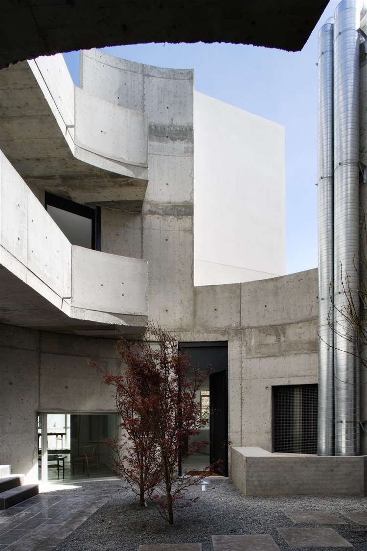 Ático en U by ÁBATON Arquitectura