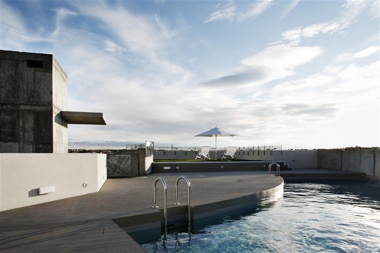 Ático en U by ÁBATON Arquitectura