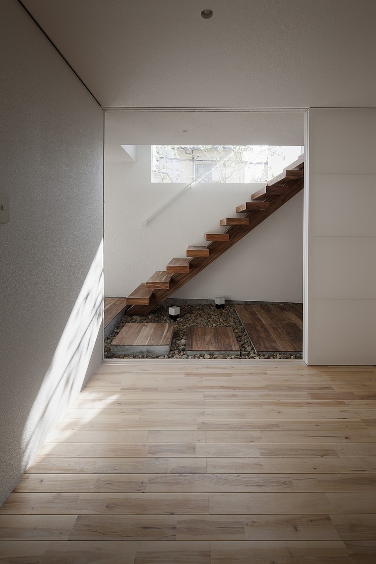 Frame House by Uid Architects & Associates