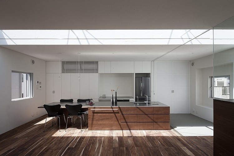 Frame House by Uid Architects & Associates