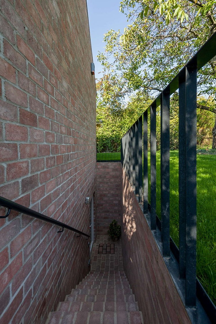 The Long Brick House by Foldes & Co. Architects