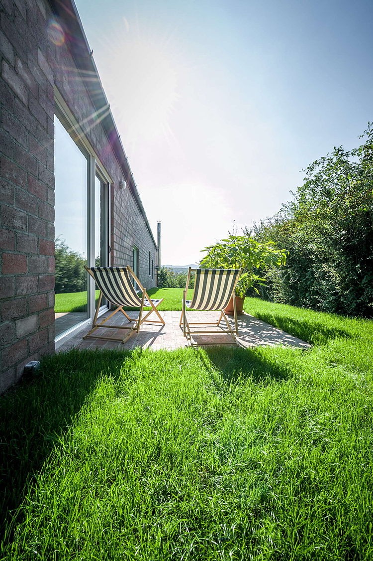 The Long Brick House by Foldes & Co. Architects