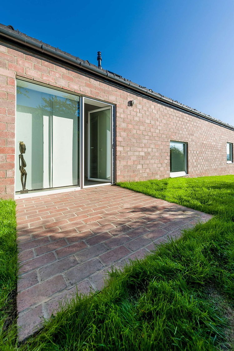 The Long Brick House by Foldes & Co. Architects