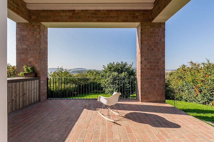 The Long Brick House by Foldes & Co. Architects