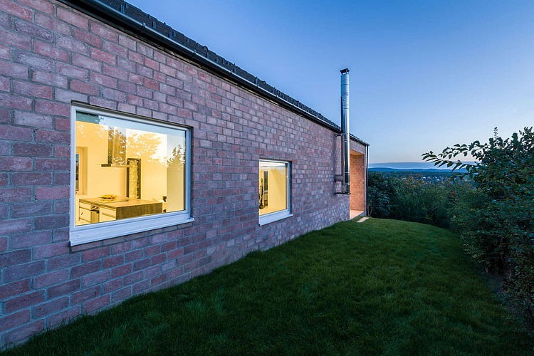 The Long Brick House by Foldes & Co. Architects