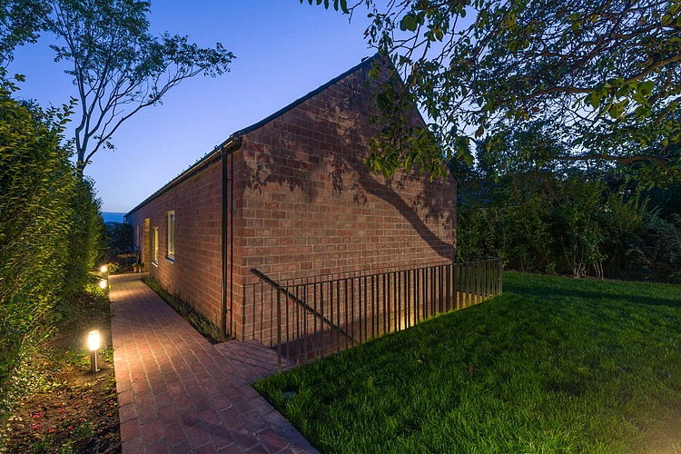 The Long Brick House by Foldes & Co. Architects