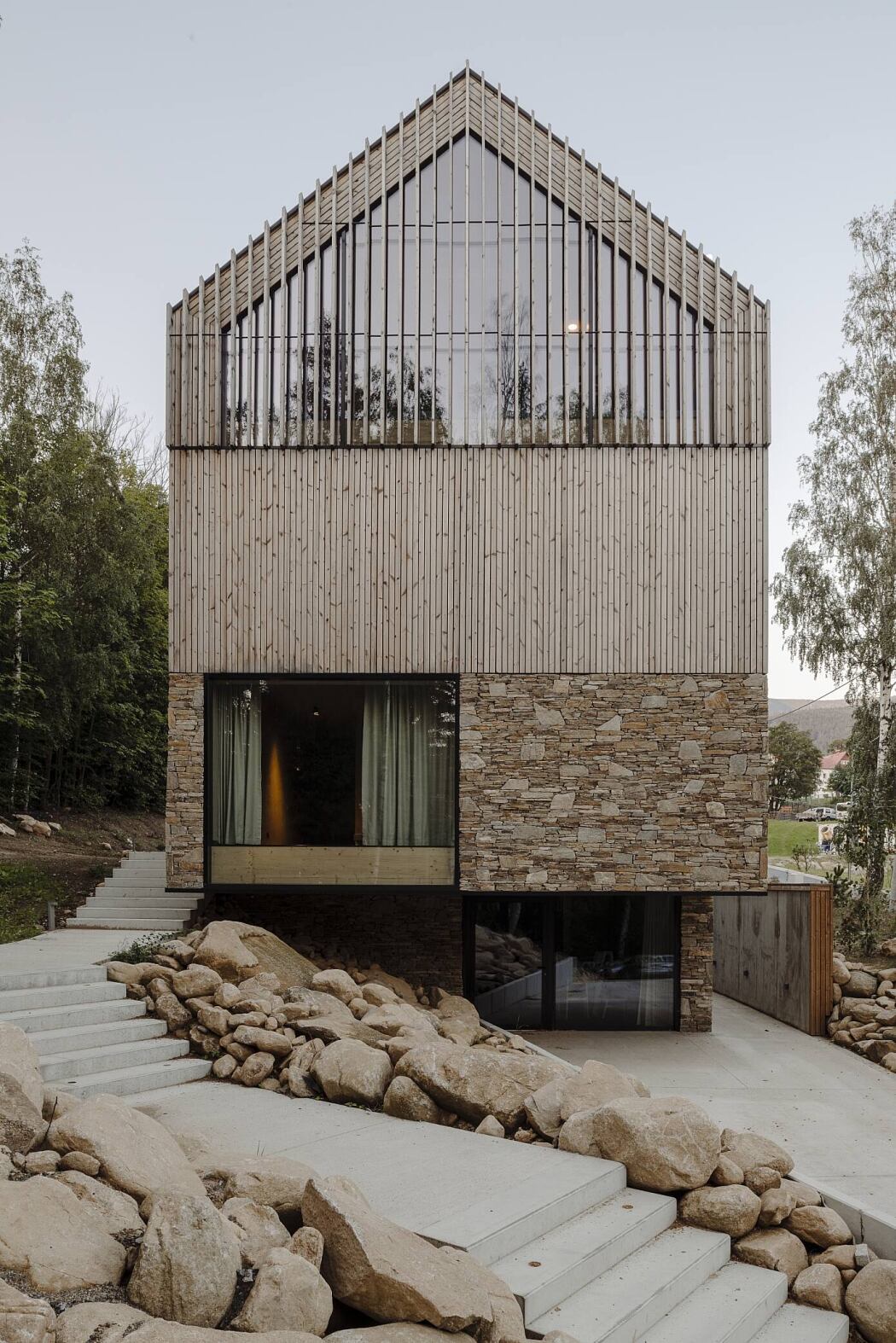 Apartments in Wolf Clearing by Studio de.materia - 2