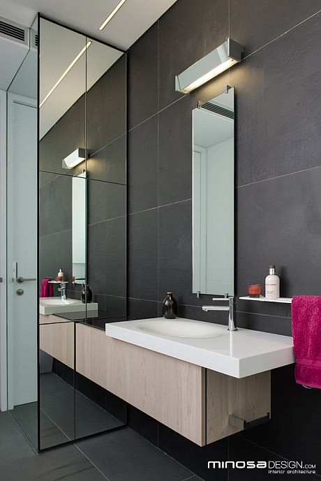 Innovative Use Of Space Creates A Seamless Bathroom Design