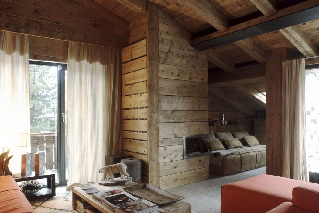 Attic in Cortina d’Ampezzo by Mario Mazzer Architects